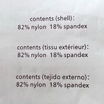 We Wore What ‎ Nylon Biker Short in Gold Photo 6