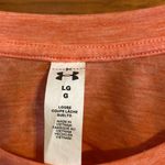 Under Armour  Women’s  long sleeve top size Lg-EUC Photo 1