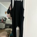 Black onesie Photo 1