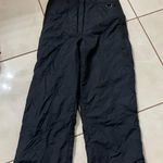 Skiing Black Overalls Photo 0