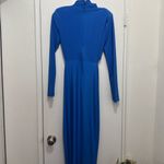 Beautiful dress ,stretchy fabric.Like new used one time only ,has couple imperfections not noticeable see last2 pictures Blue Size L Photo 6