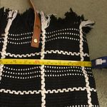 Black and White Woven Tote Bag with Tan Handles Photo 1