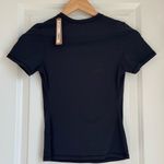 SKIMS NWT  Fits Everybody Short Sleeve
T-Shirt w/ customized logo SMALL Photo 1