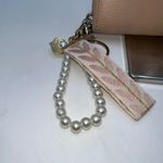 Ted Baker  Pink Faux Leather Zip Around Wallet with Pearl Charm Photo 1