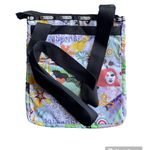 LeSportsac NWOT  printed crossbody with 3 pockets  in‎ multicolored music print Photo 2