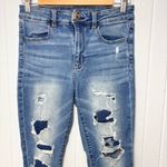 American Eagle  Outfitters Ripped Blue Skinny Jeans size 8 Regular Photo 1