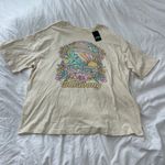 Billabong graphic tee  Size medium  Condition: NWT Color: pale yellow  Details : - Visibility tee - Oversized  - Comfy Photo 0