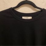 Cher Black Ribbed Curved Raw Hem Short Sleeve T Photo 1