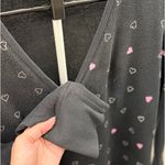 Victoria's Secret Cozy Victoria’s Secret waffle knit henley top with an allover heart print. Photo 3