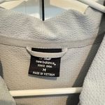 New Balance Lightweight Windbreaker Photo 1