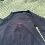 Pawz  black sweatshirt with a plaid paw at the back
No size tag Photo 2