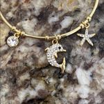 Gold Charm bracelets Photo 4