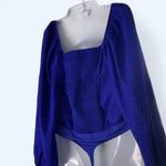 EXPRESS  Vibrant Blue Bodysuit with keyhole tie front M Photo 1