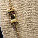 Kate Spade  Gold Tone Gold Enamel Bow Long Necklace Photo 8