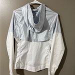 Nike Blue and White Raincoat with Hood and Water-Resistant Fabric Photo 1