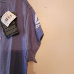 Reebok  ufc purple fighting graphic t-shirt size womens medium Photo 2