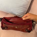 vintage wilson’s leather red y2k shoulder bag with buckle detail Photo 4