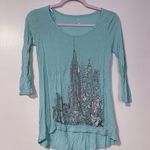 New York And Company  Teal Cityscape Long Sleeve Top Photo 0