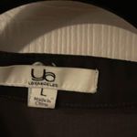 YA Los Angeles  sheer sleeveless button front top.​ Photo 3