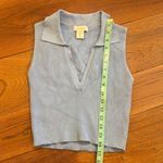 House of Harlow Chic ribbed tank with a collared V-neck. Soft and stylish for versatile wear.   1960 Light Blue Ribbed Tank Top Photo 4