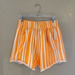 NWOT Free People Movement All Star Printed shorts sz S Orange Photo 0