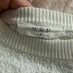 White OGD light sweater. Size small. Photo 2