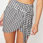 Pretty Little Thing Black gingham tie front mini skirt Photo 0