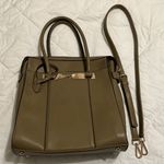 Beautiful green crossbody handbag Lots of details and pockets EUC Photo 1