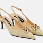 Dolce & Gabbana
Logo-embellished raffia slingback pumps Photo 9