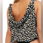 Free People NWOT Cheetah Bare It All bodysuit - hygienic sticker - vneck repair Photo 1