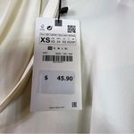 ZARA Scarf Collar Long Sleeve Blouse in a Cream Color The Cuffs have 3 Button Photo 14