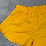 Nike  Women's Vibrant Yellow Athletic Shorts Photo 2