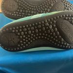 Koz kicks Aqua Slip Photo 5