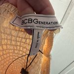 BCBGeneration  Women’s Yellow Smocked Puff Sleeve Crop Top Size Small NWT Photo 6