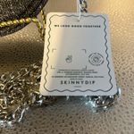 Skinny dip new with tags adorable Crossbody.. This was designed in London Photo 2