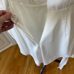 Princess Polly playsuit romper with mock wrap skirt in a size 6 Photo 7