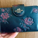 Coach Medium Corner Zip Wallet
With Floral Print # CCL20 Photo 0