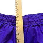 REI purple windbreaker pants that unzip at bottom measurements in pictures Size undefined Photo 5