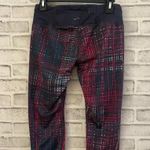 Brooks Women’s Capri length multi-colored leggings, medium Photo 1