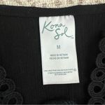Kona Sol  Black Swim Cover Photo 3