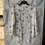 Lush Clothing LUSH White And Blue Floral Open Back Flowy Blouse- Size Medium Photo 1