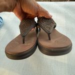 Crocs  dual confort W7 Brown Embellished Women's Sandals Photo 4