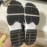 Nike Women's Grey and White Athletic Shoes Photo 3