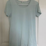 Under Armour EUC women’s pale minty blue stretch athletic heat gear top medium Photo 0