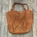 Tory Burch Brown Leather Tote with Slouchy Design and Brass Hardware Photo 0