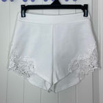 Pins and Needles women’s white embroidered zip stretch shorts XS Photo 0