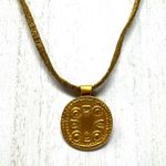 Mayan design gold tone pendant purchased in Costa Rica, on golden suede cord Photo 3