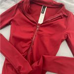 Pretty Little Thing  burgundy activewear top Photo 1