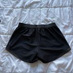 Under Armour  Womens Size Medium Black Elastic Waist Play Up Shorts Running Loose Photo 5