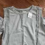 Free People NWT Shoulder Cut Out Sweatshirt Photo 1